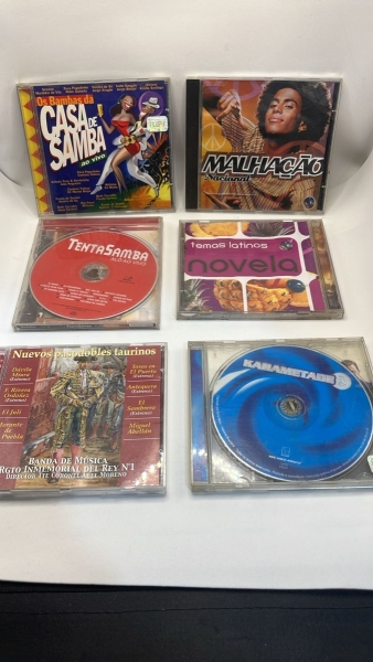 Lote de Seis CDs de Música Nacional e Internacional com Estojos de Acrílico, Inclui Álbuns Os Bambas da Casa de Samba, Malhação Nacional, TentaSamba Alô ao Vivo, Temas Latinos de Novela, Nuevos Pasodo