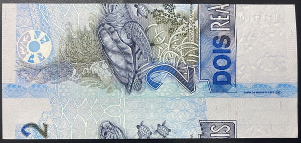 ITEM SENDO RECOLHIDO PELA CASA DA MOEDA DO BRASIL - ERRO DE CORTE E NUMERACAO INVERTIDA - CEDULA DO BRASIL - 2 REAIS (PRIMEIRA FAMILA) - FLOR DE ESTAMPA - C262 (REF. CATALOGO CLAUDIO AMATO). BEM ABAIX