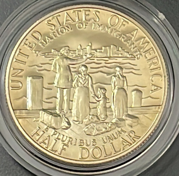 MOEDA DOS EUA - 1/2 DOLLAR 1986 - COBRE + REVESTIMENTO DE CUPRONIQUEL (ACABAMENTO PROOF) - FLOR DE CUNHO (SERA ENVIADA NA CAPSULA) - DIAMETRO (+/-): 30,61mm.
