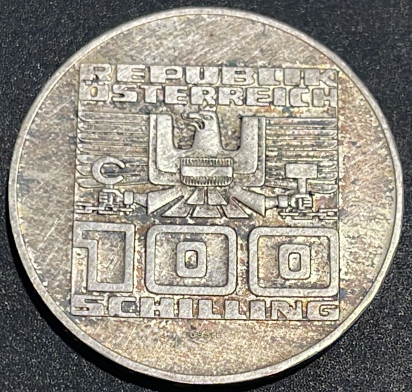 MOEDA DA AUSTRIA - 100 SCHILLING 1975 - PRATA .640% - DIAMETRO (+/-): 36mm.