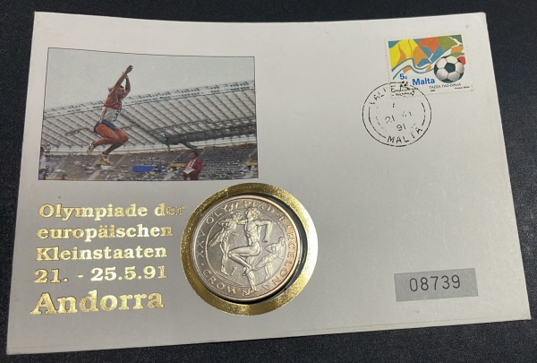 MOEDA DE GIBRALTAR - 1 CROWN 1991 (COMEMORATIVA DOS JOGOS OLIMPICO DE BARCELONA) NO ENVELOPE COM SELO DO DIA DE LANÇAMENTO - CUPRONIQUEL - DIAMETRO (+/-): 38mm.