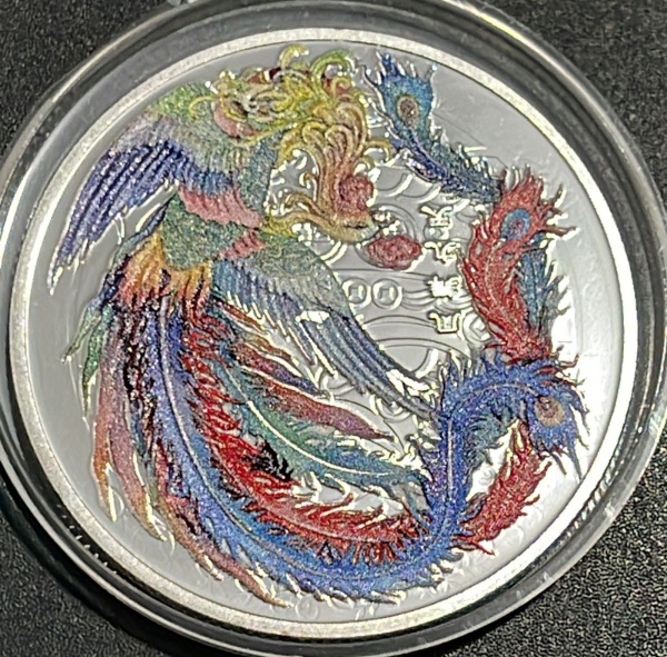MEDALHA (ANO DO DRAGAO) - CUPRONIQUEL COM ACABAMENTO PRATEADO - DIAMETRO (+/-): 40mm - SERA ENVIADA NA CAPSULA ORIGINAL.