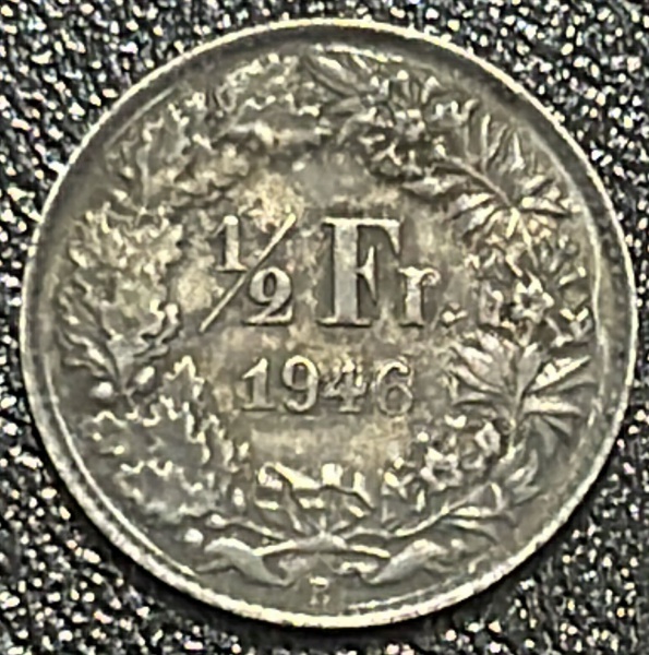 MOEDA DA SUICA (HELVETICA) - 1/2 FRANCS 1946 - PRATA .835% - DIAMETRO (+/-): 18,2mm.