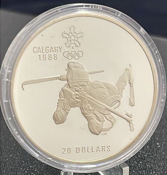 MOEDA DO CANADA - 20 DOLLARS 1986 (XV Jogos Olímpicos de Inverno, Calgary 1988 - Biatlon) - PRATA .925% - DIAMETRO (+/-): 40mm.