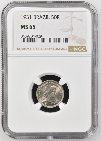 Moeda do Brasil: 50 Réis 1931 - Al V070 - Niquel - Graduação NGC MS 65 - Flor de Cunho Excepcional. Apenas 20 mil unidades cunhadas. MS: A sigla vem de Mint State, que significa que a moeda nunca circ