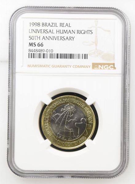 Moeda do Brasil: 1 Real 1998 - 50 Anos da Declaração dos Direitos Humanos - Bimetal - Graduação NGC MS 66 - Flor de Cunho Excepcional - Segunda Maior graduação na NGC
