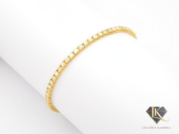 Pulseira RIVIERA em Ouro Amarelo 18K com 54 Diamantes de 3 Pontos cada (1,62 Cts), Lapidação: 8/8, Cor: JK e Pureza: SI à P3, 18cm de comprimento, peso de 6.8 gramas. Acompanha Certificado de Garantia