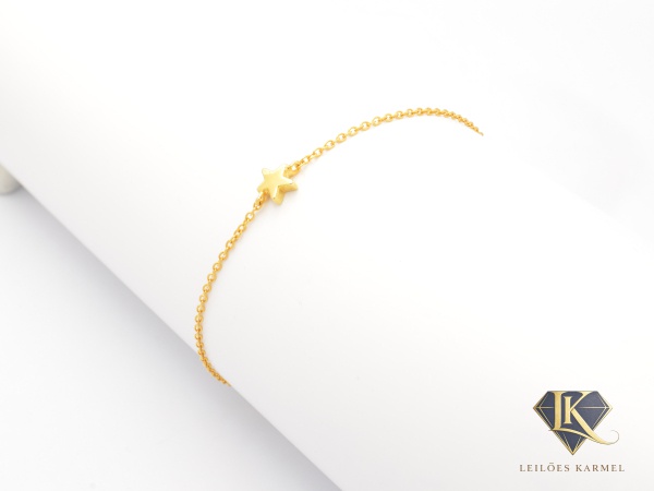 Pulseira TOUS com Estrela em Ouro Amarelo 18K, 17,5cm de comprimento, peso de 1,4 gramas. Acompanha Certificado de Garantia Leilões Karmel.