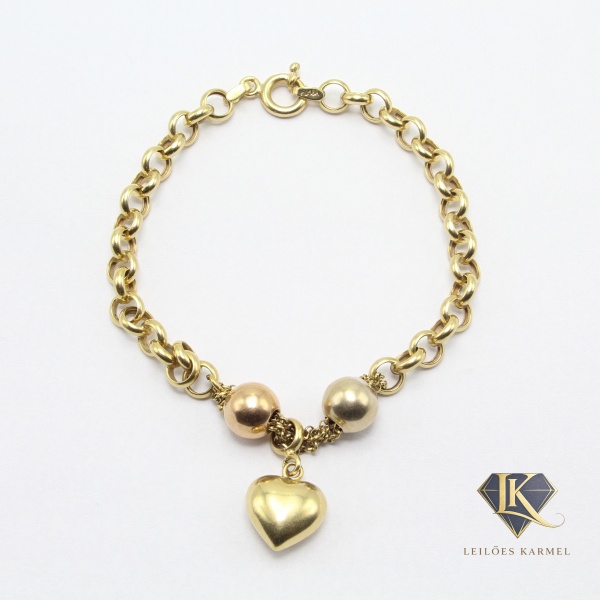 Pulseira Elos Português com Esferas e Coração Bombê em Ouro Amarelo 18K, 19cm de comprimento e Peso de 6,40gr. Acompanha Certificado de Garantia Leilões Karmel.