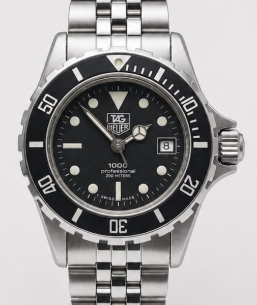 RELÓGIO TAG HEUER SUBMARINER LADY. TAMANHO: 28MM. MOVIMENTO: QUARTZ. CAIXA: EM AÇO. OS RELÓGIOS SÃO VENDIDOS NO ESTADO DE CONSERVAÇÃO QUE SE ENCONTRA. SÃO RELÓGIOS USADOS ONDE É POSSÍVEL VERIFICAR DET