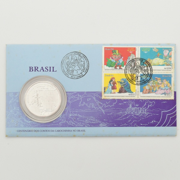 Casa da Moeda do Brasil - Centenário dos Contos da Carochinha no Brasil, em prata 999, tendo no anverso livro aberto com o título Contos da Carochinha, com letras em estilo gótico e a ponte inferior d