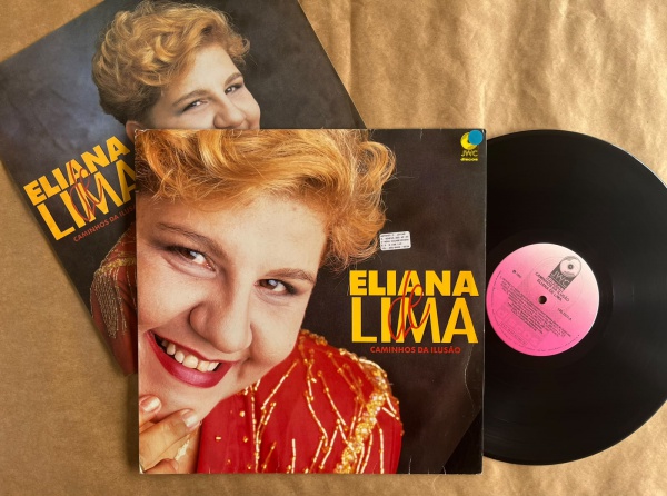 LP: Artista: Eliana de Lima / Album: Caminhos da Ilusão | Selo: JWC discos | Cód: 140 1021Capa (VG): Muito Bom: marcas superficiais, com detalhes visuais; pode conter leve rasura como um nome. Vinil (
