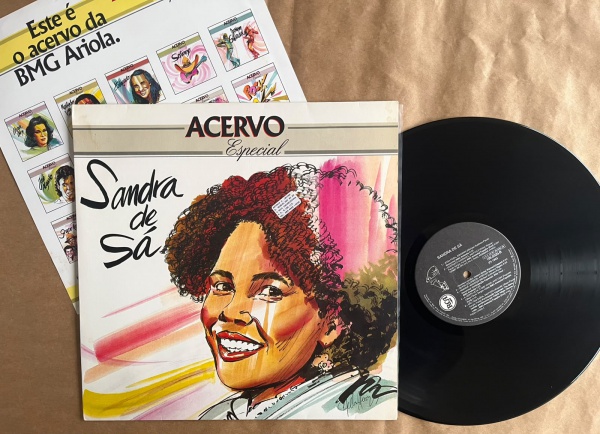 LP: Artista: Sandra de Sá / Album: Sandra de Sá, Acervo especial | Selo: RCA | Cód: 109 0320Capa (VG): Muito Bom: marcas superficiais, com detalhes visuais; pode conter leve rasura como um nome. Vinil