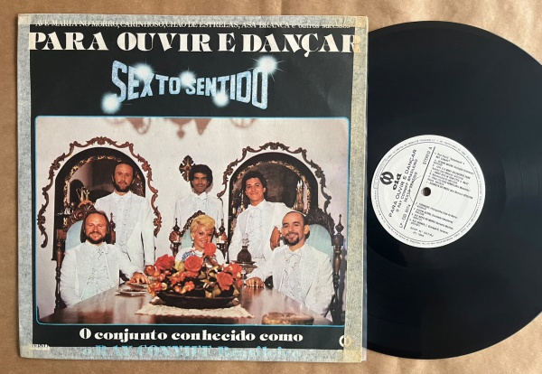LP: Artista: Sexto Sentido / Album: O Ray Conniff Brasileiro | Selo: CID | Cód: CID-8074Capa (VG -): Muito Bom: marcas superficiais, com detalhes visuais; pode conter leve rasura como um nome; leve de