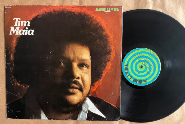 LP: Artista: Tim Maia / Album: Tim Maia | Selo: Som Livre | Cód: 403 6129Capa (VG): Muito Bom: marcas superficiais, com detalhes visuais; pode conter leve rasura como um nome. Vinil (VG): Vinil em mui