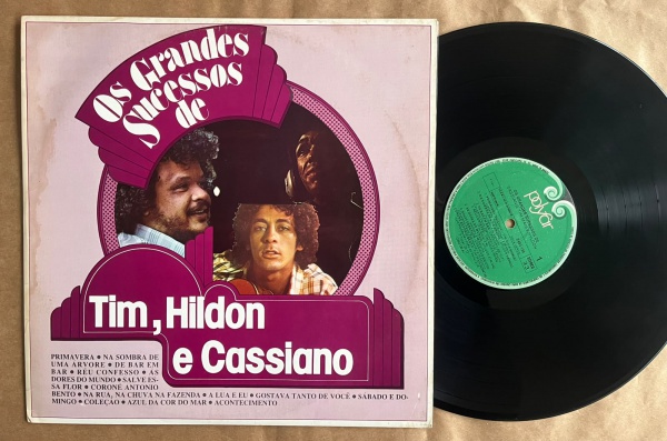 LP: Artista: Tim, Hildo e Cassiano / Album: Os grandes Sucessos de Tim, Hildo e Cassiano | Selo: Polyfar | Cód: 2493 139Capa (VG): Muito Bom: marcas superficiais, com detalhes visuais; pode conter lev