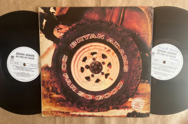 LP: Artista: Bryan Adams / Album: So far So Good | Selo: A&M Records | Cód: 540 157/183Capa (VG): Muito Bom: marcas superficiais, com detalhes visuais; pode conter leve rasura como um nome. Vinil (VG