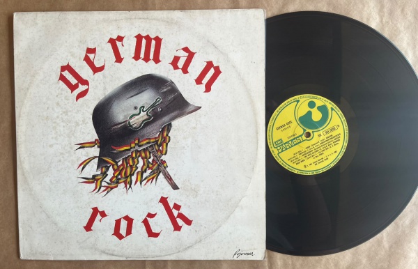 LP: Artista: German Rock / Album: German Rock, coletânea | Selo: Harvest | Cód: 31C 064 78293Capa (VG): Muito Bom: marcas superficiais, com detalhes visuais; pode conter leve rasura como um nome. Vini