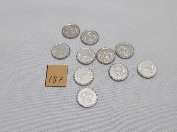 Brasil - 10 moedas de 1 centavo em aço inoxidável, datadas de 1986, Medindo 15 mm, pesando 1.6 gramas.