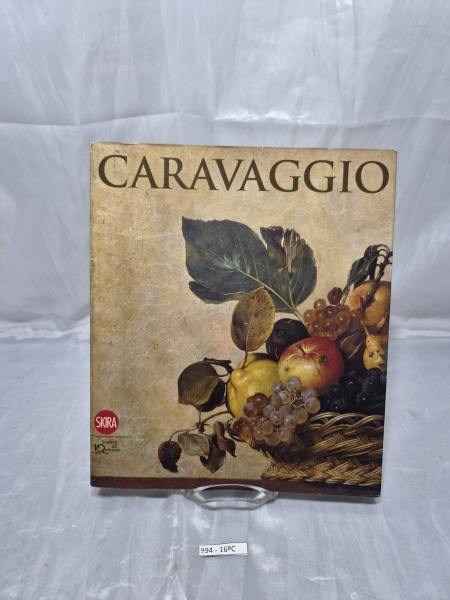Livro de arte "Caravaggio", publicado pela editora Skira em parceria com as Scuderie del Quirinale, texto em italiano, capa brochura ilustrada, em bom estado de conservação com discretas marcas de man