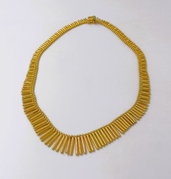 Impactante Colar em Ouro Amarelo 750 - Contraste da Grife. Comprimento 46,0cm. Peso 51,4g.