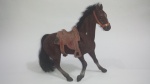 Brinquedo representando cavalo em plástico rígido, antigo, no estado. Tamanho: 020 x 024 cm.