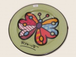 Prato medalhão de porcelana Vista Alegre, Edição especial Romero Brito. 36 cm