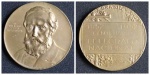 Medalha de bronze, circular, Brasil, assinada com monograma: CL. 50mm. 70g. (ANV) DR. / GUILHERME / SCHÜCH / DE CAPANEMA; efígie CL.; (VER) BRASIL / reserva retangular: 1852 1952 / CENTENÁRIO / DO / TELÉGRAFO / NACIONAL; QUINTA IMPERIAL / 11 DE MAIO;(BORDO) CASA DA MOEDA. MBC. - Rara