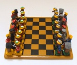 Josineide - Jogo de xadrez em barro cozido pintado 26x26cm com 32 peças representando o jogo