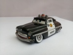 Miniatura Mercury Policia / Sheriff, Filme The Cars, ferro, aprox. 8 x 4 x 3cm, apresenta desgastes, segue no estado apresentado nas fotos