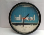 Relógio Parede Cigarros Hollywood, aprox. 26 x 4cm, funciona com 1 pilha AA (pilha não acompanha), acrílico, com marcas do tempo