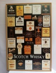 Quadro Emoldurado Contendo Diversos Rótulos de Marcas de Whisky; aprox. 90,5 x 62 x 2cm, com marcas do tempo