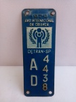Plaqueta Original de Licenciamento Detran / PM-SP, 1979, AD4438; aprox. 11 x 4cm, apresenta desgastes