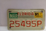 Placa de Moto, Florida, Made U.S.A., aprox. 18 x 10cm, apresenta marcas do tempo, segue no estado apresentado nas fotos