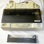 Impressora matricial EPSON ,acompanha fita lacrada e papéis