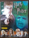 Belo álbum de Harry Potter A Ordem da Fênix, em perfeito estado. Faltam 23 figurinhas das 276 totais. (A82)