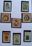 Selos do Brasil, parte de coleção, selos protegidos por Maximaphil de fundo preto. (S150)