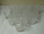 Conjunto com 12 copos de vidro transparente diverso .