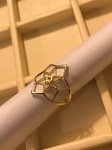 JOIA- Belo anel banhado a ouro, galeria vazada representando estrela. Aro 22