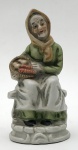 Sem marca - peça decorativa de cerâmica italiana com imagem de figura de senhora sentada com cesto, aprox. 15 x 7,5 cm de diâmetro