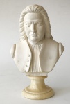 A., Gionelli - Escultura decorativa de busto representando Bach com base em mármore, medida total aprox. 24 x 15 x 8 cm.