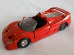 Miniatura Ferrari WL-9814, escala 1/43 , em ferro, pneus borracha,  algumas partes faltantes, para-brisa trincado; aprox. 12 x 5,5 x 5,5cm