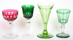 BACCARAT - Conjunto com quatro taças de coleção em cristal francês sendo três verde double e translúcido e uma rubi translúcido.