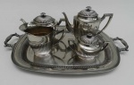 Jogo de chá e café com cinco paças, de metal prateado Eberle
