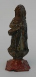Nossa Senhora em terracota, com resquícios de policromia, sobre base de madeira. sec.XIX - altura 17cm.