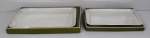 Conjunto de 2 bandejas de metal Christofle, medindo 33 x 43 e 29 x 37 cm. (Sem uso nas caixas).