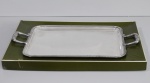 Bandeja de metal Christofle, modelo Malmaison, com 2 alças. Mede 32 x 55 cm. (Sem uso na caixa).
