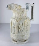CHARLES MIEGH - INGLATERRA  (ativo entre 1835 - 1861) - THE APOSTLE JUG (A JARRA DOS APÓSTOLOS) - ITEM MUITO RARO TENDO PEÇA SEMELHANTE NO METROPOLITAN MUSEUM , VICTORIA AND ALBERT MUSEUM E OUTROS ( ver links) .  Rara jarra para vinho em porcelana pasta dura tipo stoneware simulando marmorizado, decorada ao gosto gótico, tendo rico trabalho em alto e baixo relevo dos 12 apóstolos de cristo, máscaras e nichos. Data da execução anterior a 1839 fase ainda sem a marca da fabricante, apenas a numeração.  Med. 22x 17 x 10 cm. Possui restauro profissional na borda. Este jarro de 'apóstolo', em estilo gótico, é um dos designs mais icônicos e bem sucedidos de jarras moldadas em relevo e retrata figuras em nichos arquitetônicos. O item foi tão procurado que passou a ter a marca de registro aplicada em sua base, para informar que o projeto foi registrado no Registro de Design, estabelecido em 1839 para proteger o trabalho original de ser copiado por outros fabricantes com menor qualidade. Preço medio no mercado internacional de 300 a 690 dólares - VER LINKS: http://collections.vam.ac.uk/item/O11506/apostle-jug-charles-meigh-co/  e ver: https://www.metmuseum.org/art/collection/search/120010601 e também valores: https://www.1stdibs.com/furniture/dining-entertaining/pitchers/circa-1842-english-staffordshire-apostle-jug-8-saints-gothic-arches/id-f_976072/ ENGLISH: This jug has been relief moulded; a mass-production technique which involved one process, using elaborate plaster moulds, with no extra work required for adding decoration. Such wares could thus be produced in large numbers and were affordable and durable. Jugs, such as this one, were amongst the most widely used utilitarian vessels of the Nineteenth century; decorative as well as practical. Many different firms produced them and hundreds of different designs existed, as the competition to supply the cheap mass market was intense. Often the same design was produced in different sizes.This 'apostle' jug, in the Gothic style, is one of the most iconic and successful of relief-moulded jug designs and depicts figures in architectural niches. It has an applied registration mark on its base, which tells us that the design was logged at the Design Registry, established in 1839 to protect original work from being copied.