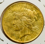 Curioso Dólar cunhado com duas faces. Datado de 1922. Borda serrilhada. Folheado a ouro 24k