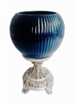 Centro de mesa com parte superior em porcelana vitrificada azul em forma de esfera com frisos em relevo